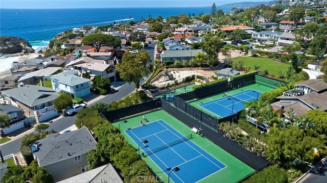an aerial view of a house with a garden