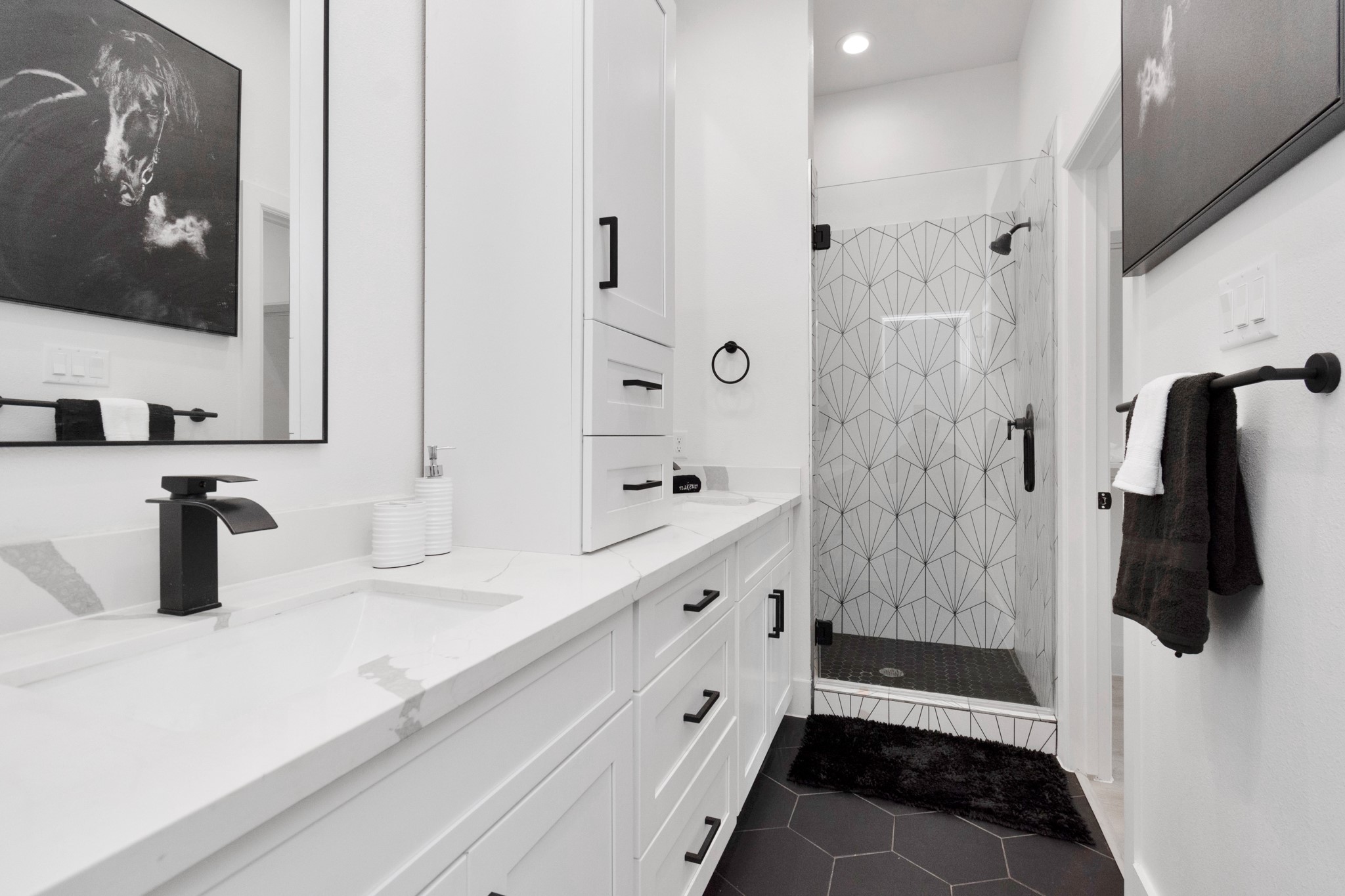 5308 Denmark Street Houston, TX 77028 - Photo 22 of 36 a bathroom with a sink and a mirror