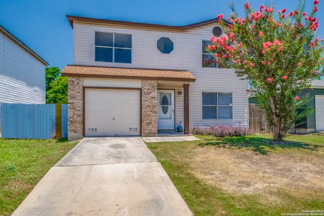 a front view of house with yard