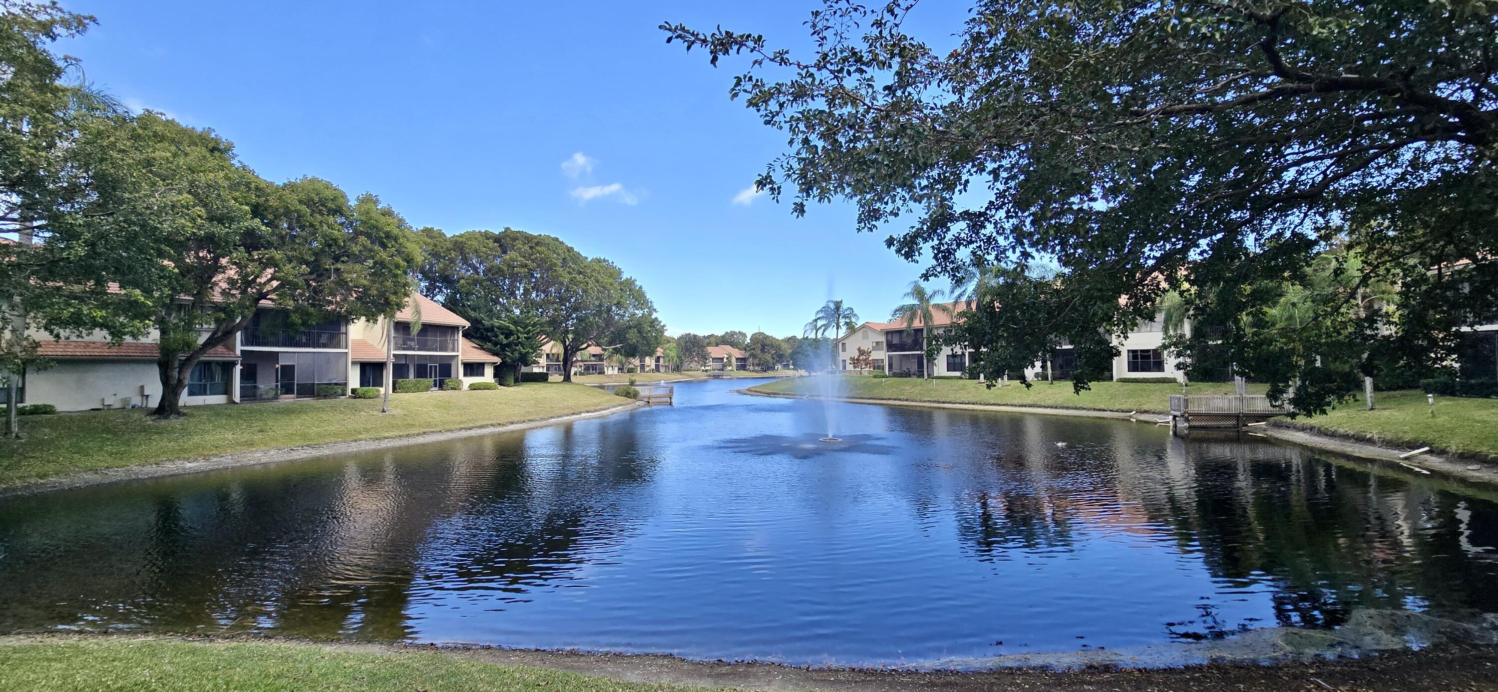 5521 Coach House Circle, Unit D Boca Raton, FL 33486 - Photo 2 of 32 LONG LAKE VIEWS