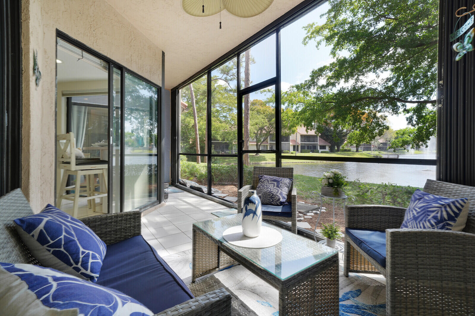 5521 Coach House Circle, Unit D Boca Raton, FL 33486 - Photo 26 of 32 SCREENED IN PATIO