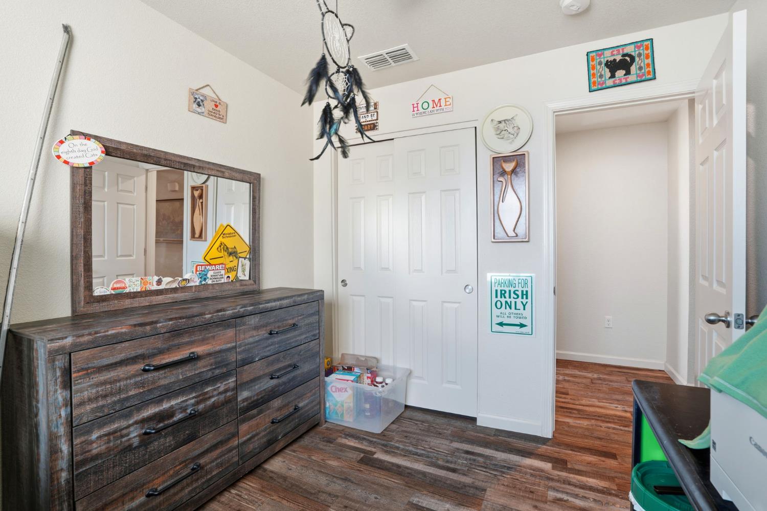 296 Dena Court Merced, CA 95341 - Photo 21 of 34 a view of hallway with wooden floor