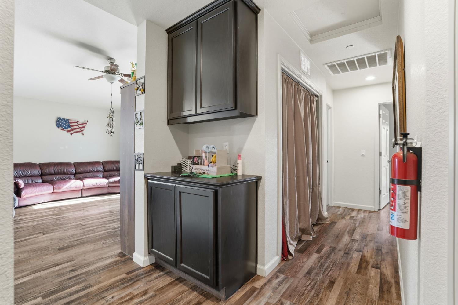 296 Dena Court Merced, CA 95341 - Photo 24 of 34 a kitchen with stainless steel appliances granite countertop a refrigerator and a stove