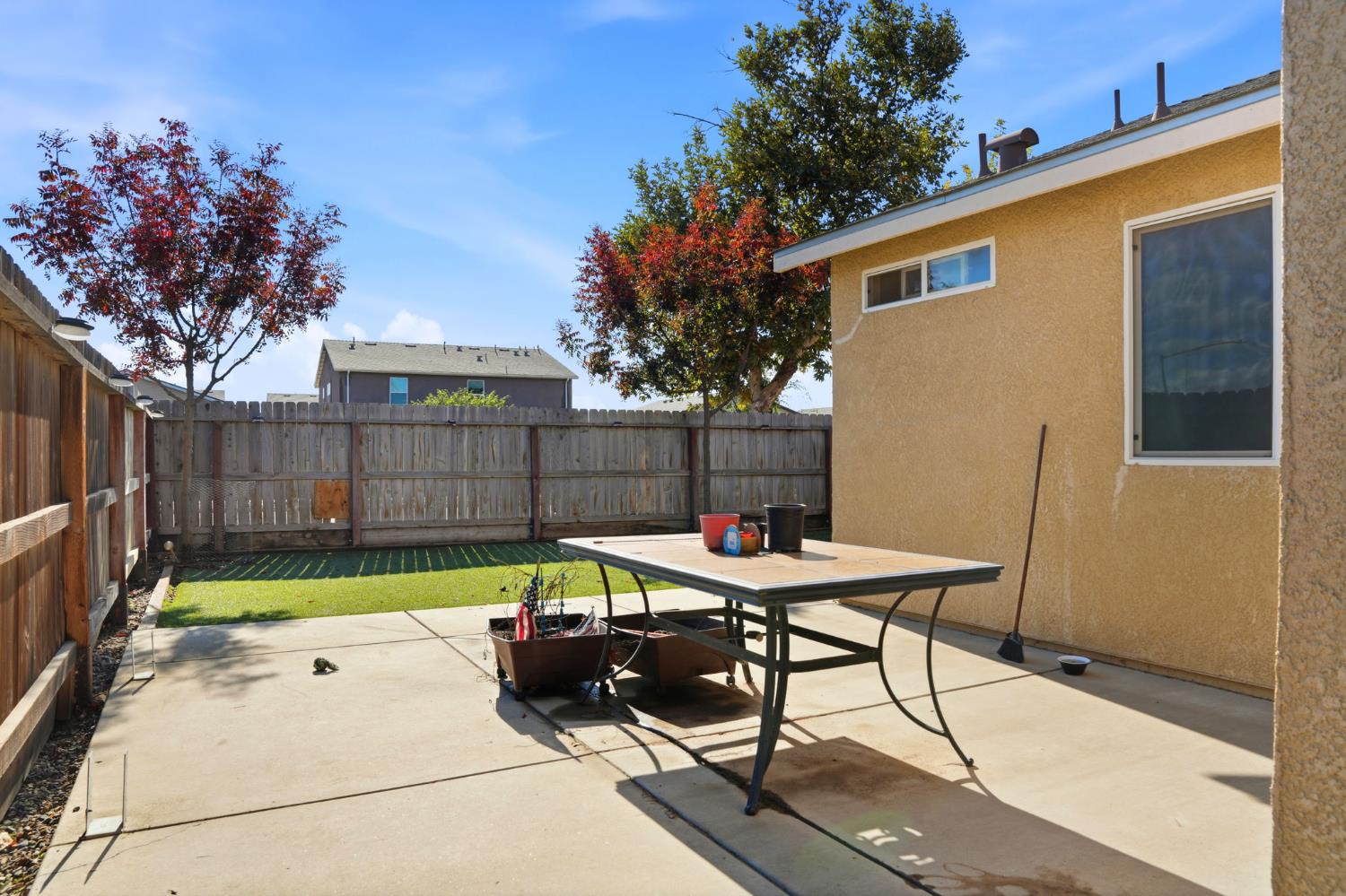296 Dena Court Merced, CA 95341 - Photo 29 of 34 a view of a backyard with furniture and a backyard