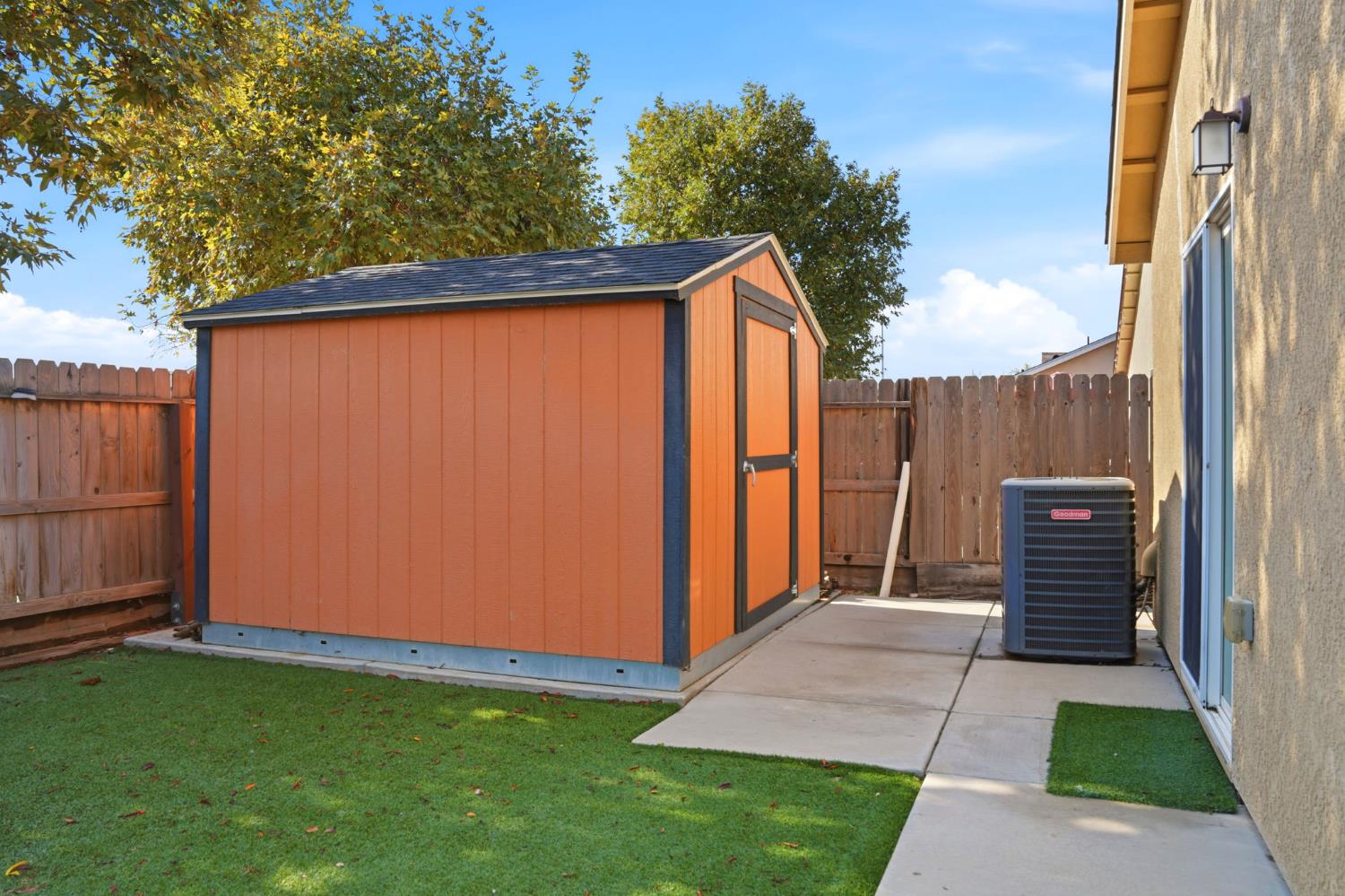 296 Dena Court Merced, CA 95341 - Photo 31 of 34 a backyard of a house with barbeque oven