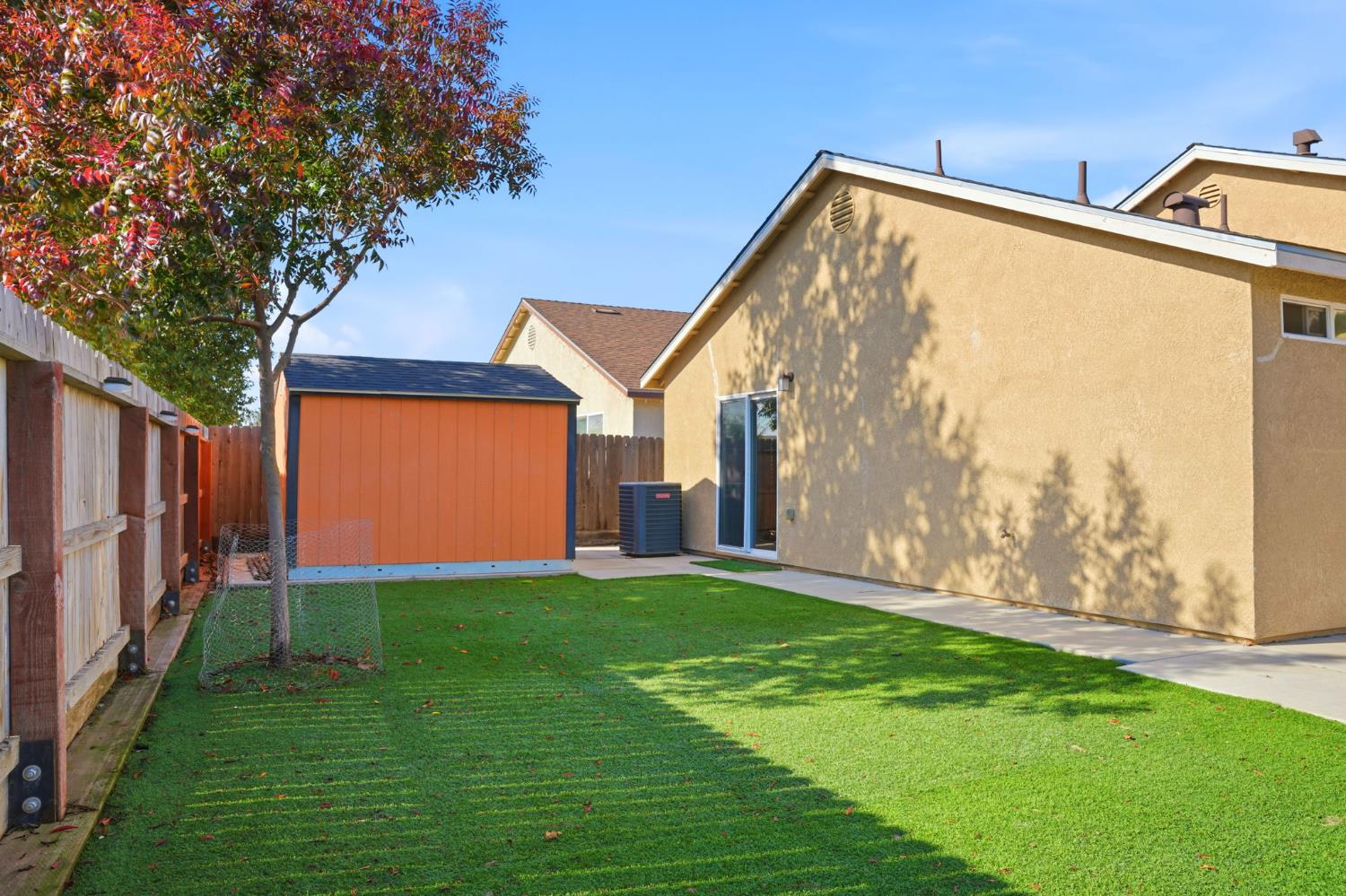 296 Dena Court Merced, CA 95341 - Photo 32 of 34 a front view of a house with garden