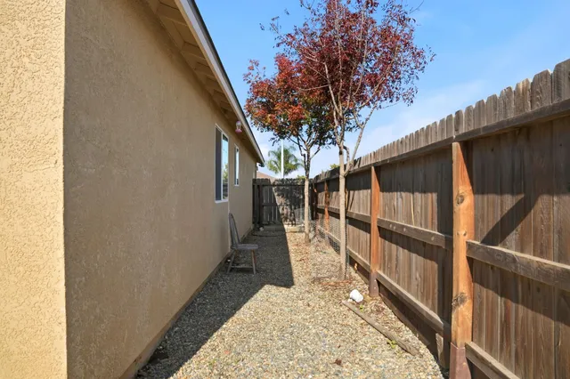 a view of balcony with wooden floor and stairs
