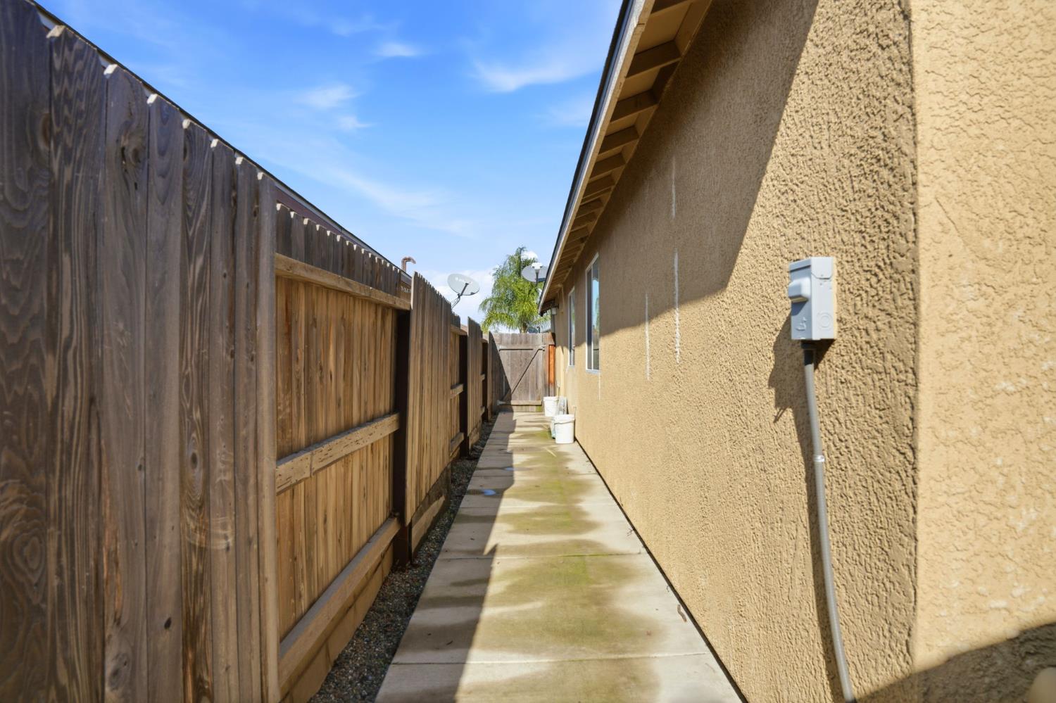 296 Dena Court Merced, CA 95341 - Photo 34 of 34 a view of balcony with wooden floor and stairs