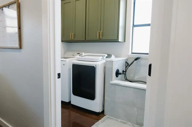 a utility room with dryer and washer