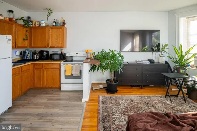 a living room with furniture and a swimming pool