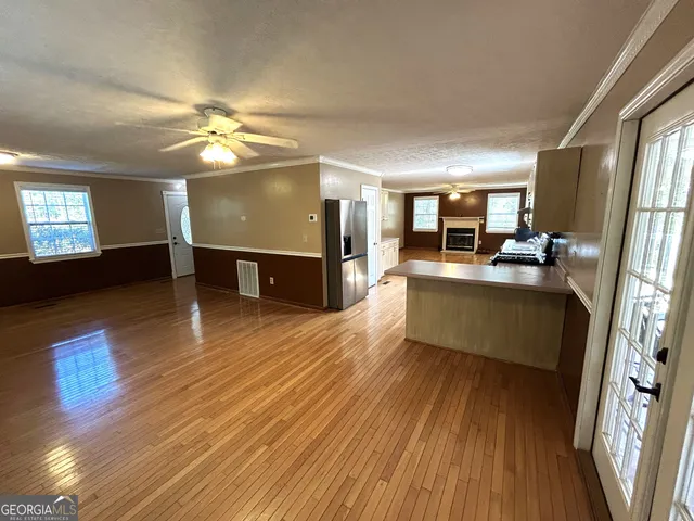 a view of storage and utility room with washer and dryer