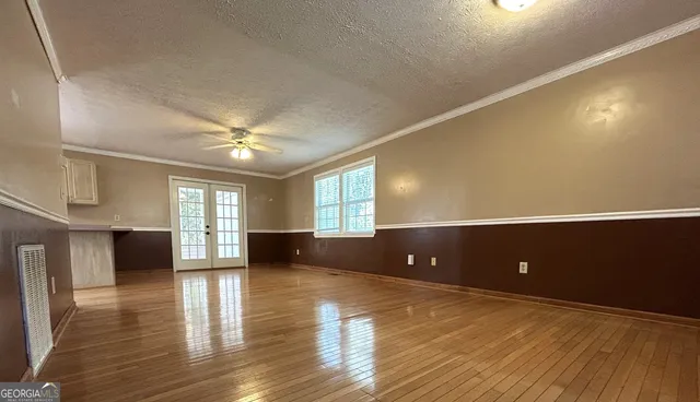 a bathroom with a sink vanity mirror and toilet