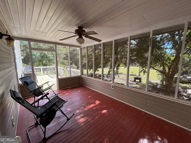 a kitchen with a stove a sink and a refrigerator