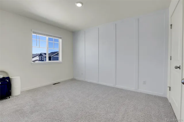 a bathroom with a shower sink and mirror