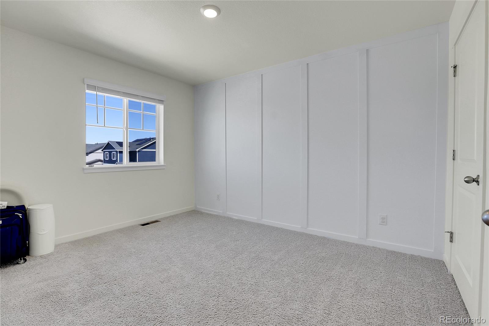 45840 Laceleaf Drive Bennett, CO 80102 - Photo 21 of 43 a view of an empty room with a window