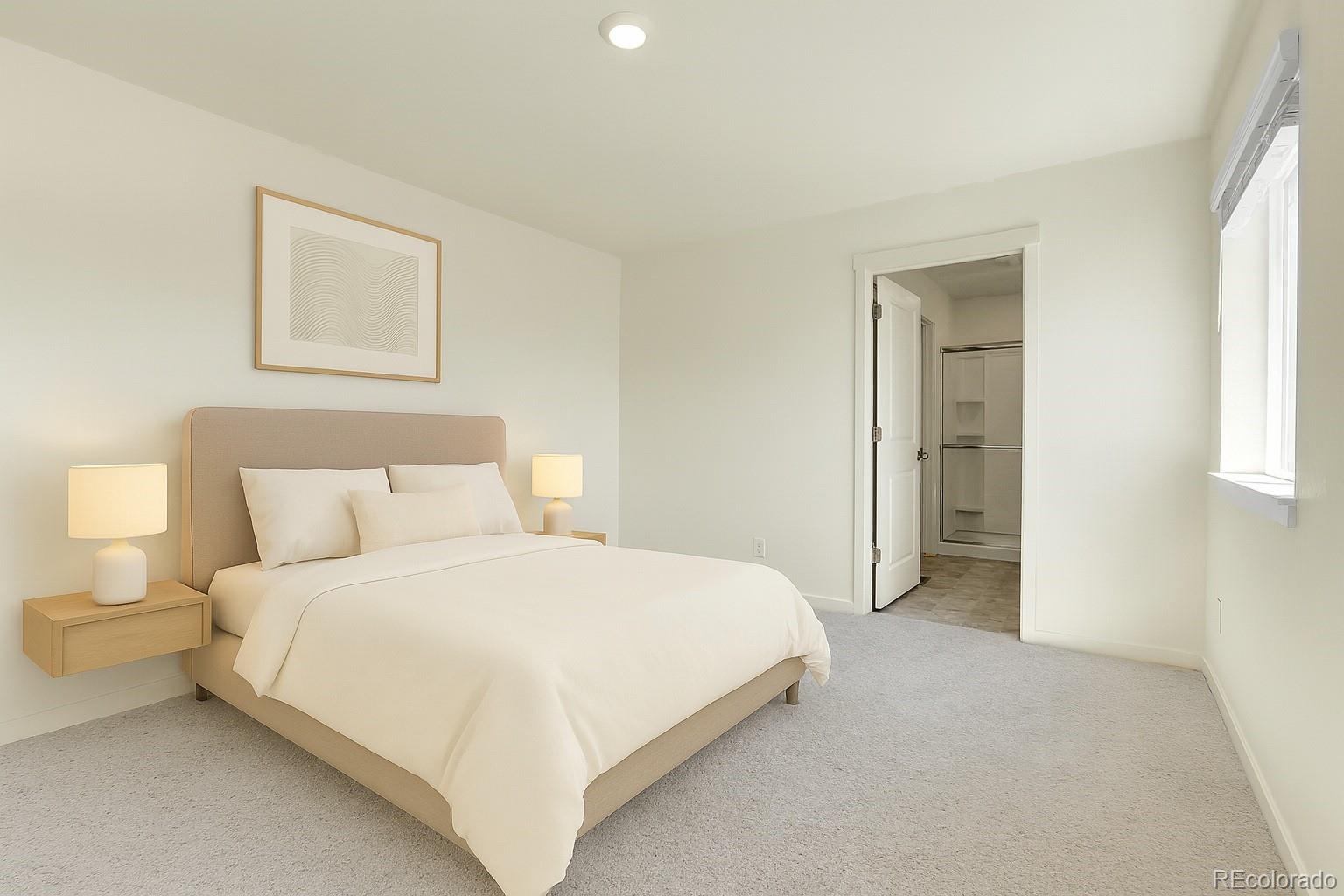45840 Laceleaf Drive Bennett, CO 80102 - Photo 26 of 43 a bedroom with a bed and a lamp