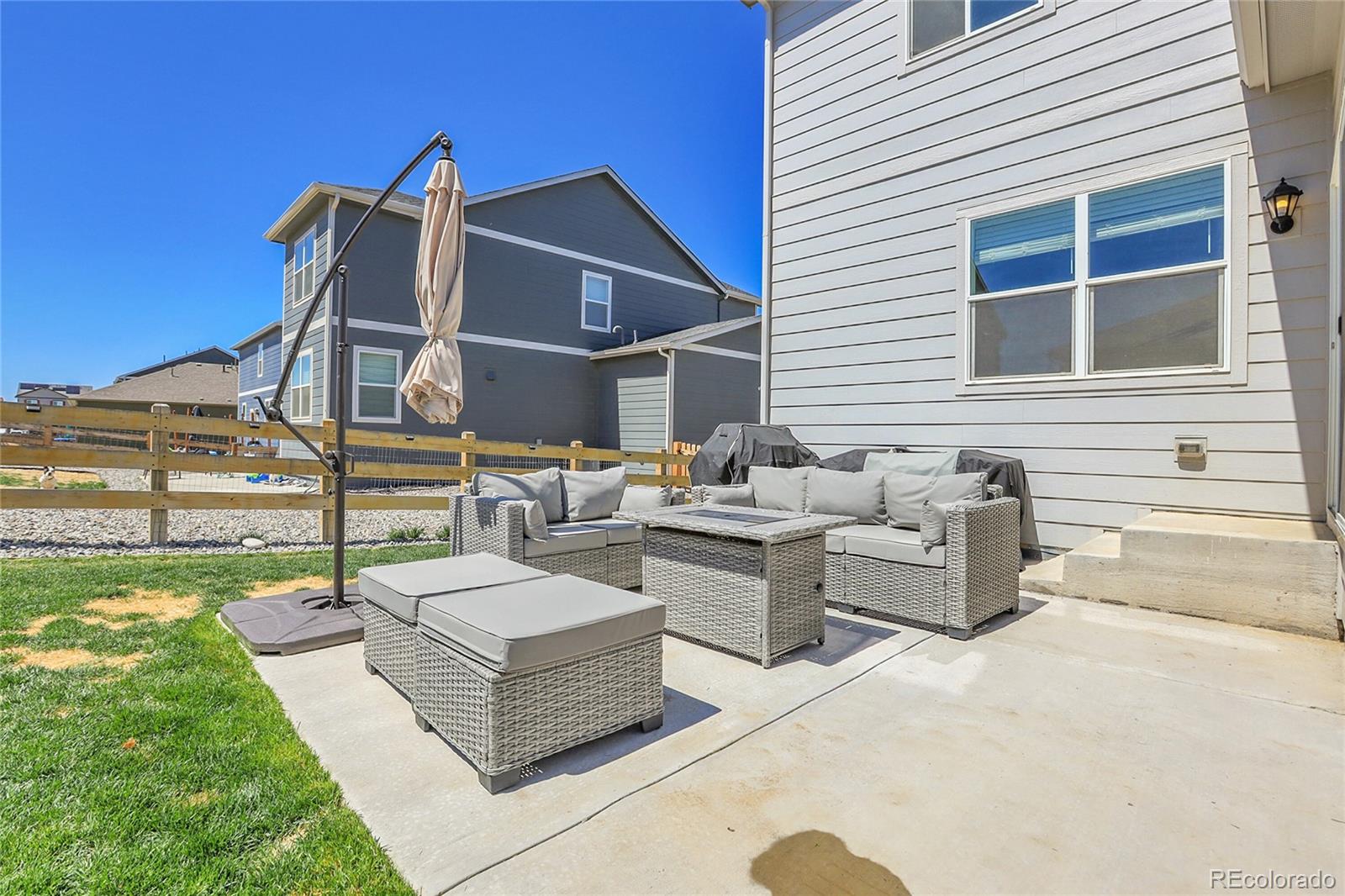 45840 Laceleaf Drive Bennett, CO 80102 - Photo 36 of 43 a front view of a house with patio