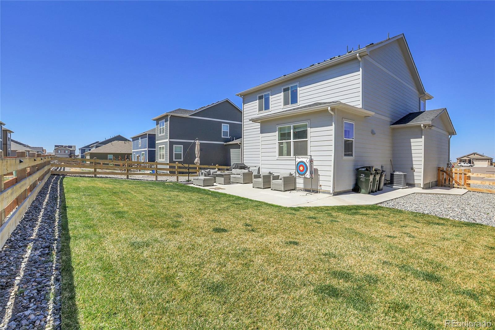 45840 Laceleaf Drive Bennett, CO 80102 - Photo 39 of 43 a view of a house with swimming pool