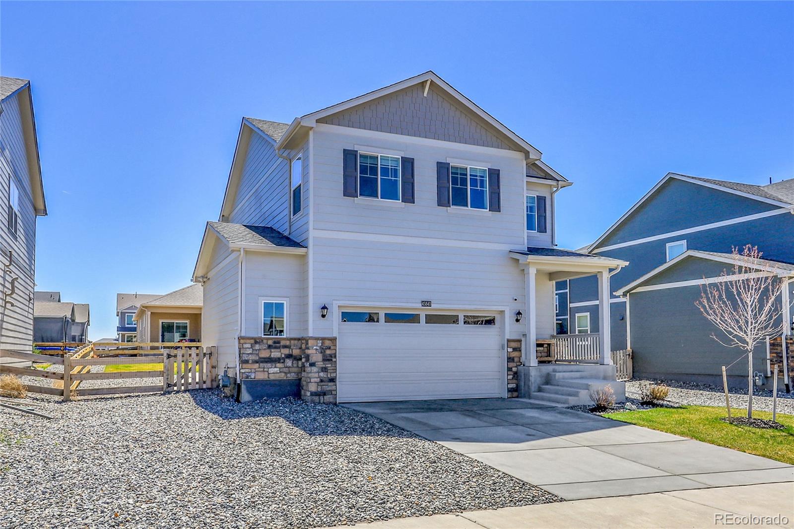 45840 Laceleaf Drive Bennett, CO 80102 - Photo 42 of 43 a view of a house with backyard patio and fire pit