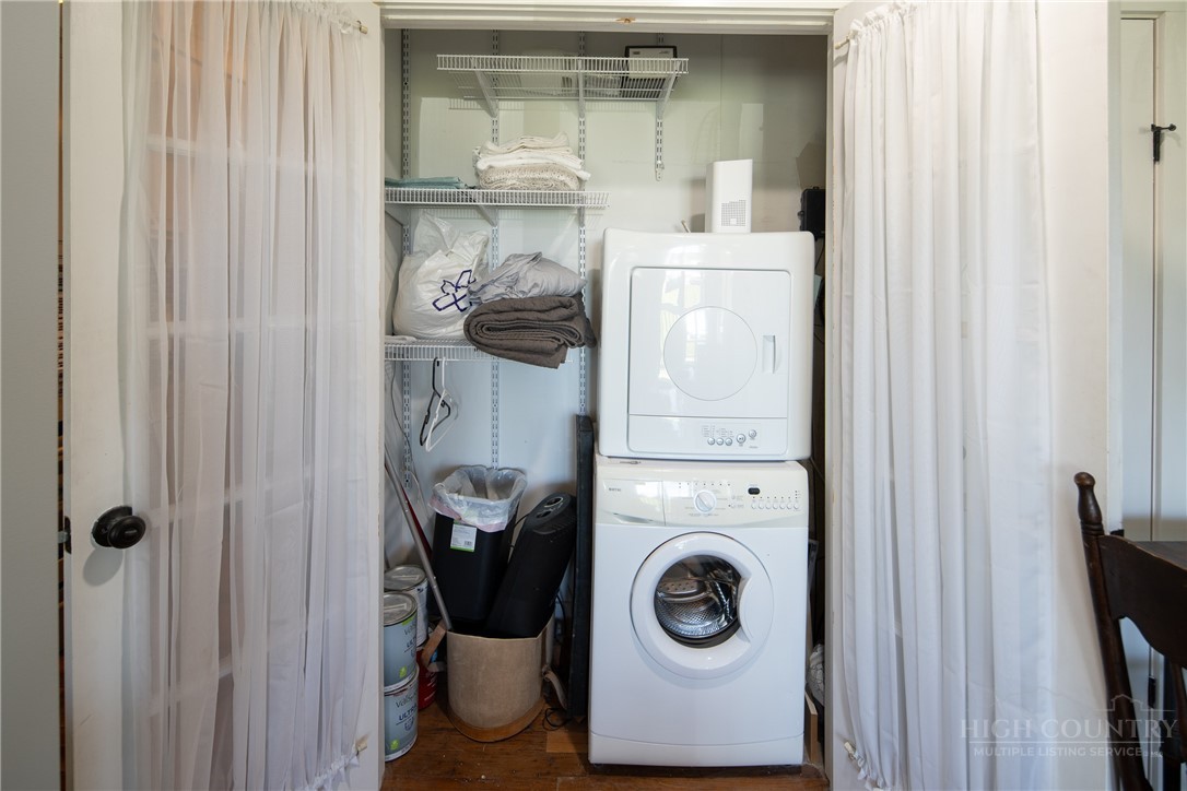 301 Pinnacle Inn Road, Unit 4103 Beech Mountain, NC 28604 - Photo 15 of 43 a utility room with dryer and washer