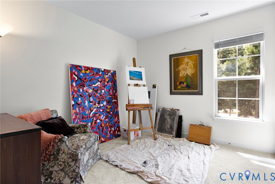 6549 Bolles Landing Court Chester, VA 23831 - Photo 17 of 22 a bedroom with a bed and a window