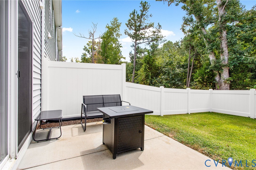 6549 Bolles Landing Court Chester, VA 23831 - Photo 20 of 22 a view of a backyard with chairs