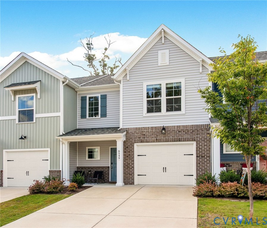 6549 Bolles Landing Court Chester, VA 23831 - Photo 2 of 22 a front view of a house with garden