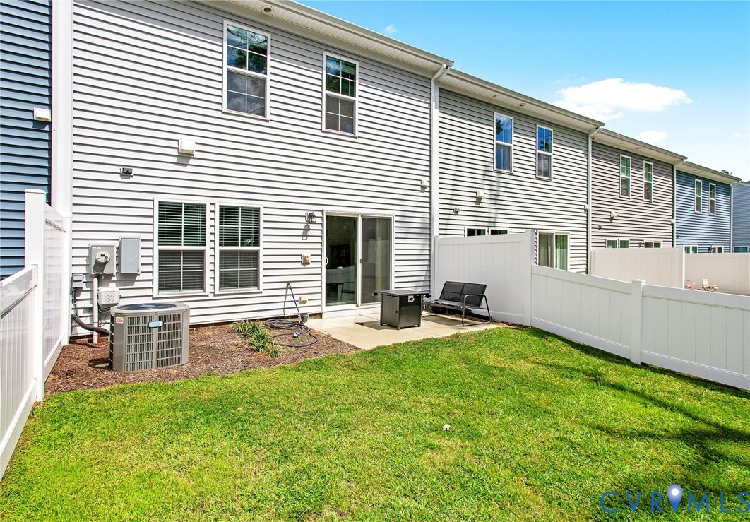6549 Bolles Landing Court Chester, VA 23831 - Photo 22 of 22 a view of a backyard with a garden and entertaining space