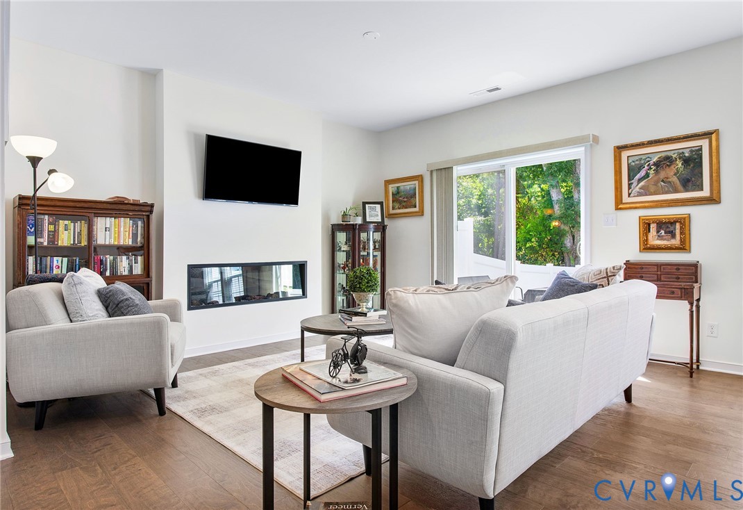 6549 Bolles Landing Court Chester, VA 23831 - Photo 6 of 22 a living room with furniture and a flat screen tv