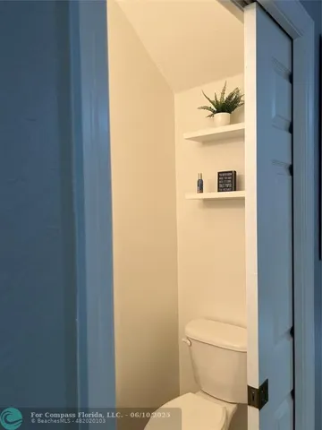 a kitchen with a stove and a microwave