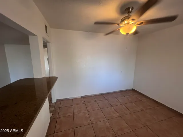 a view of a livingroom with wooden floor
