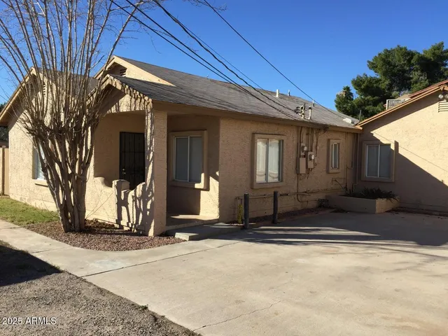 a view of a house with a park