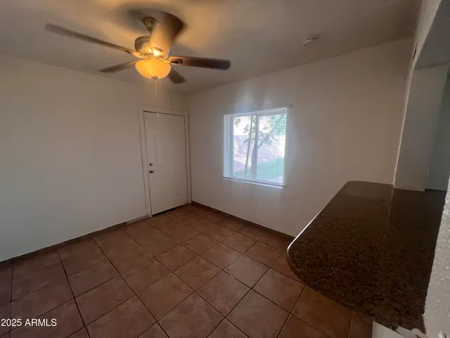 a view of a livingroom with a window