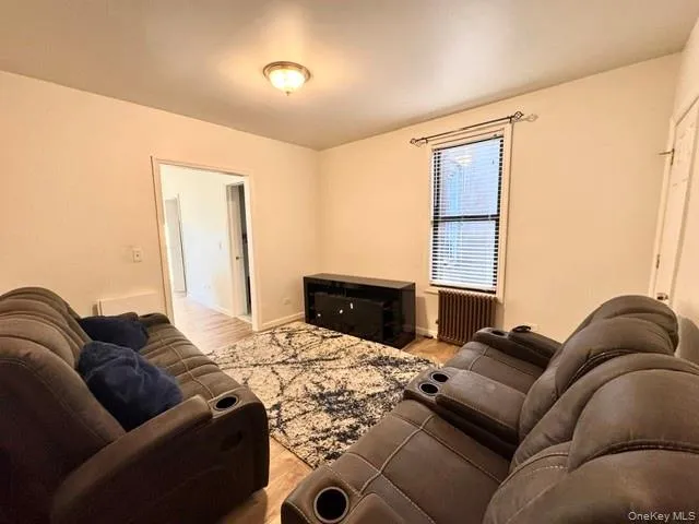 a living room with furniture window and a lamp
