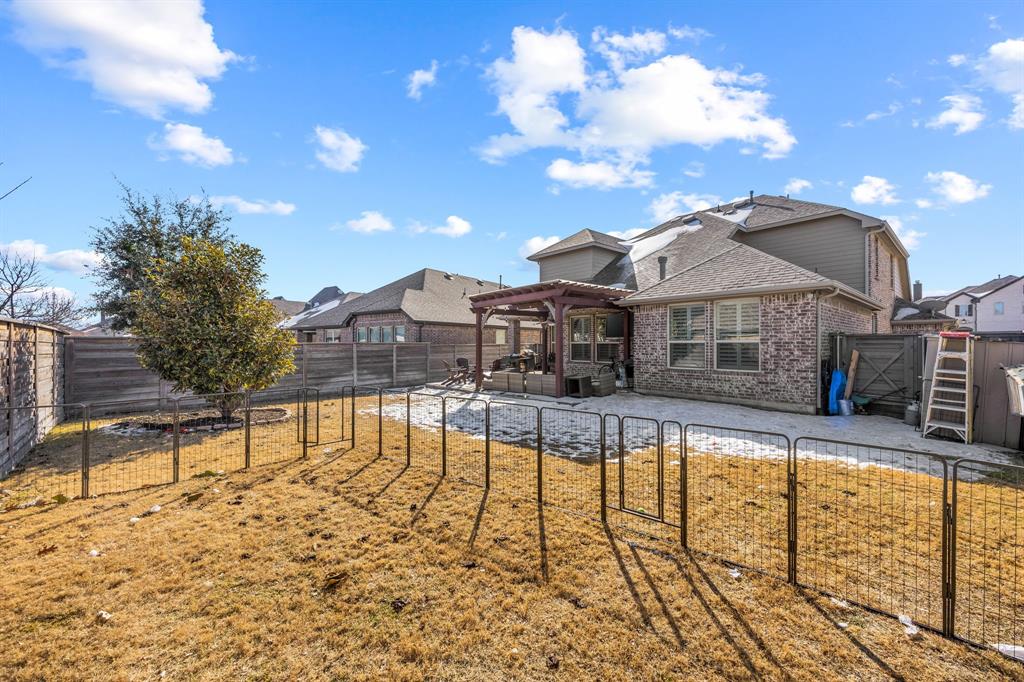 813 Pier Street Little Elm, TX 76227 - Photo 15 of 16 a view of a swimming pool with a lounge chairs