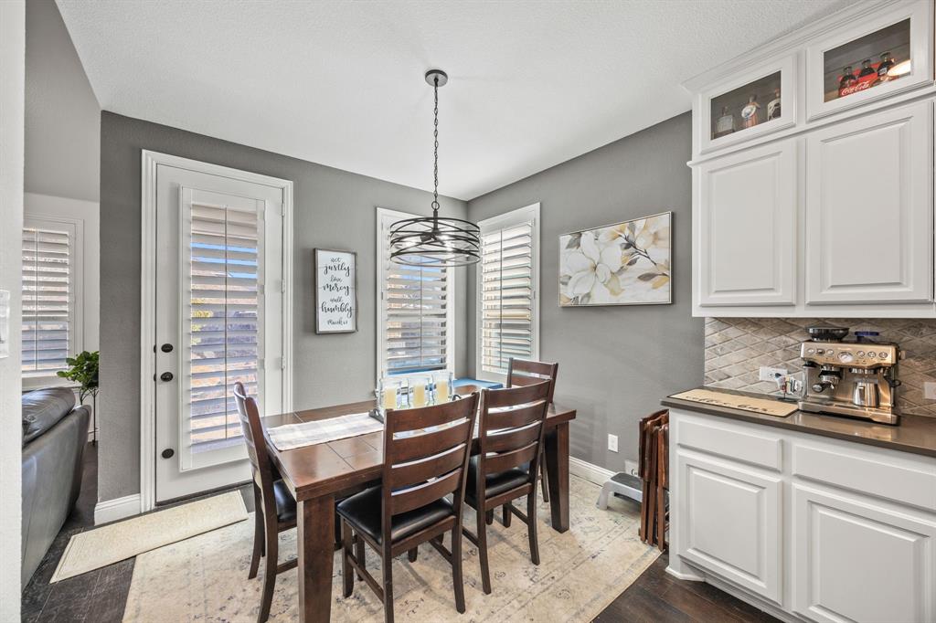 813 Pier Street Little Elm, TX 76227 - Photo 7 of 16 a dining room with furniture and window