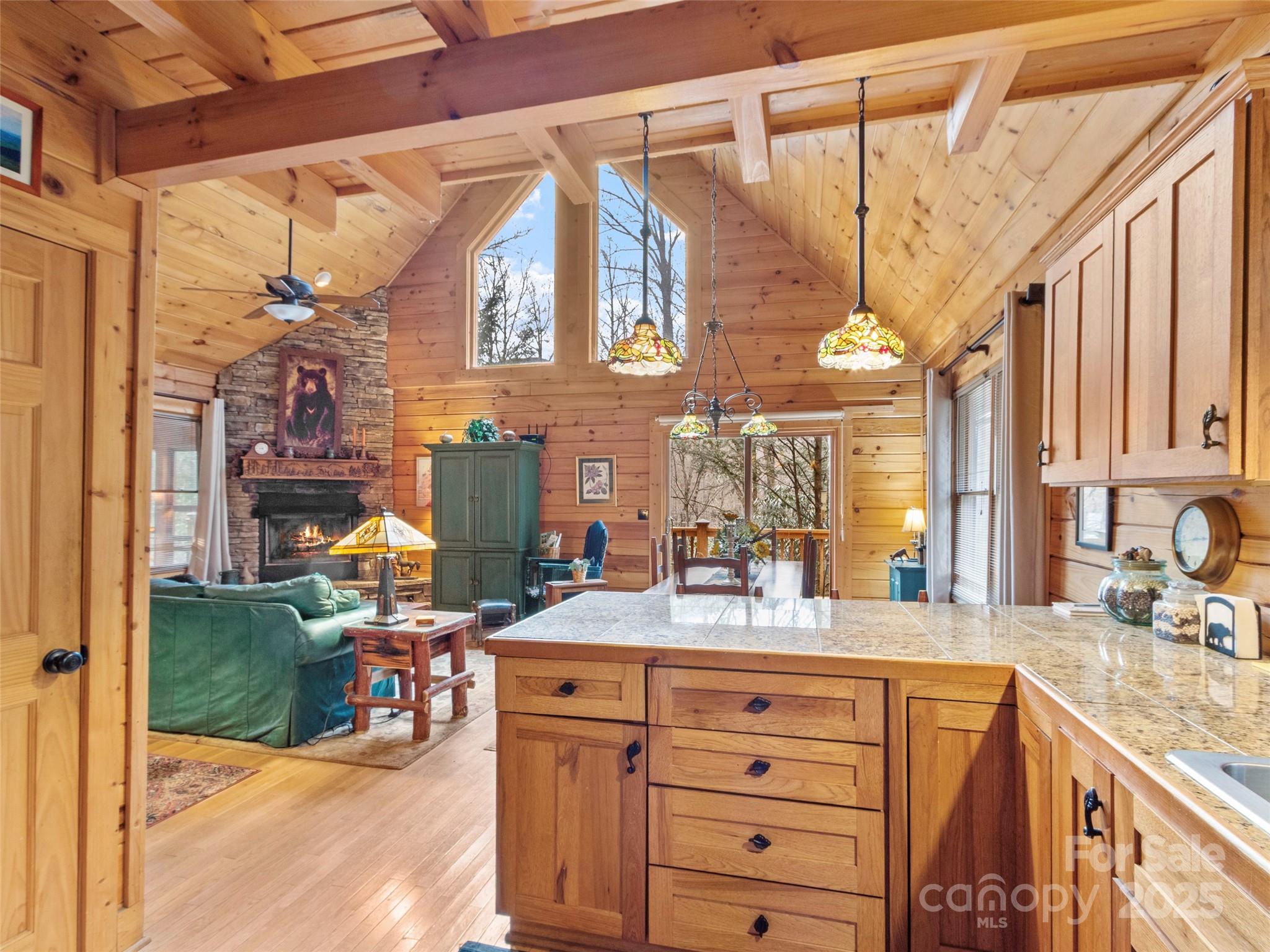 741 South Toe River Road Burnsville, NC 28714 - Photo 20 of 41 a bathroom with a sink vanity granite tub shower and a mirror