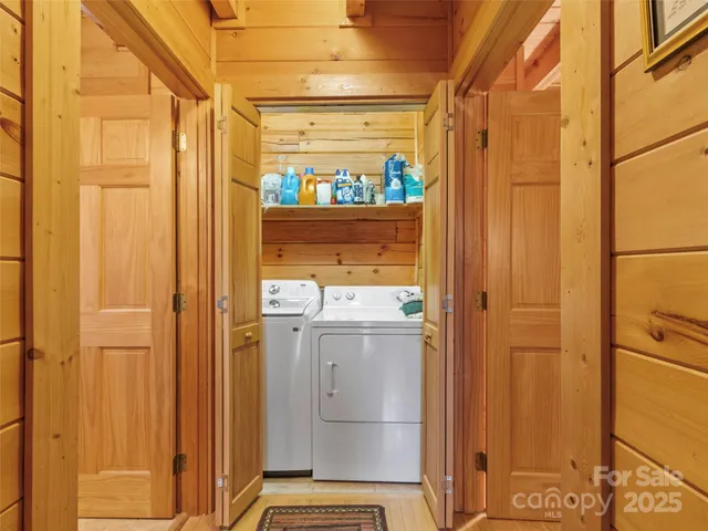 a bathroom with a shower and a sink