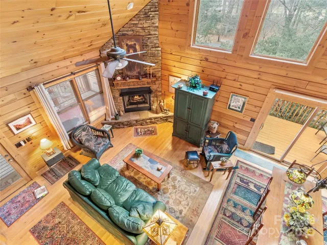 a view of a patio with table and chairs with wooden floor