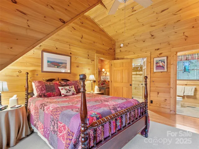 a bedroom with a large bed and a closet