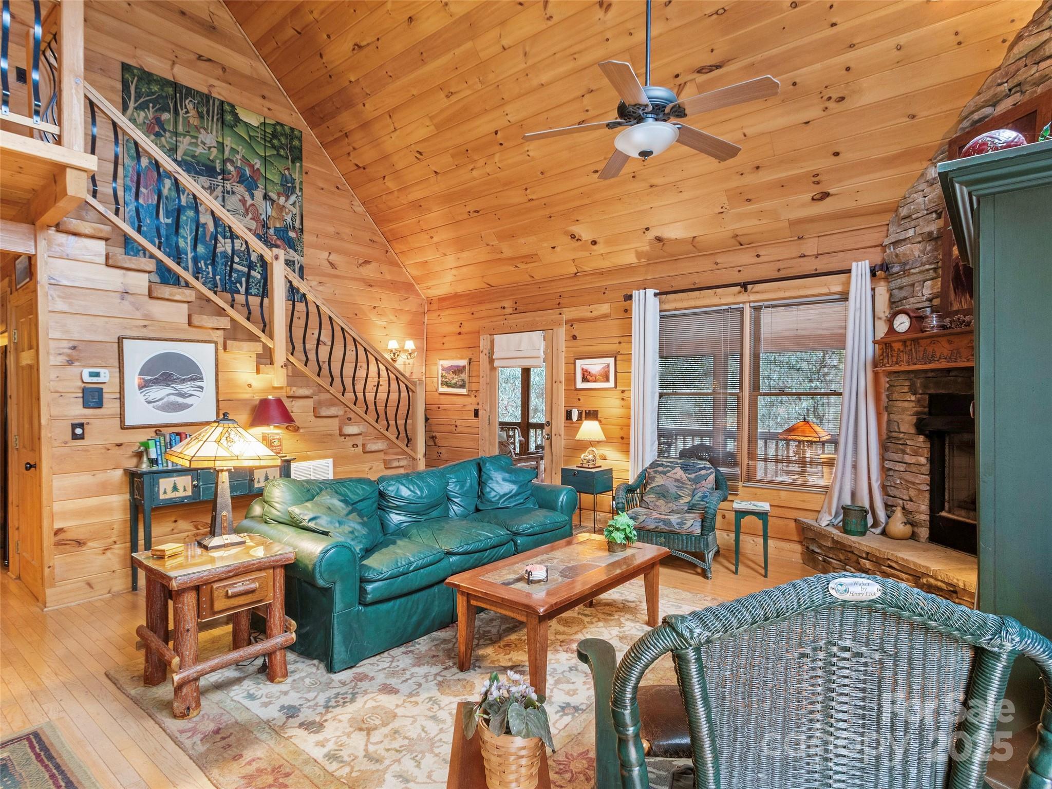 741 South Toe River Road Burnsville, NC 28714 - Photo 8 of 41 a outdoor living space with furniture and garden view