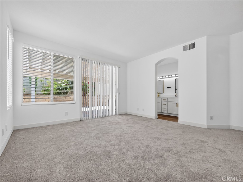 1436 Riviera Avenue Banning, CA 92220 - Photo 32 of 43 a view of an empty room with a window