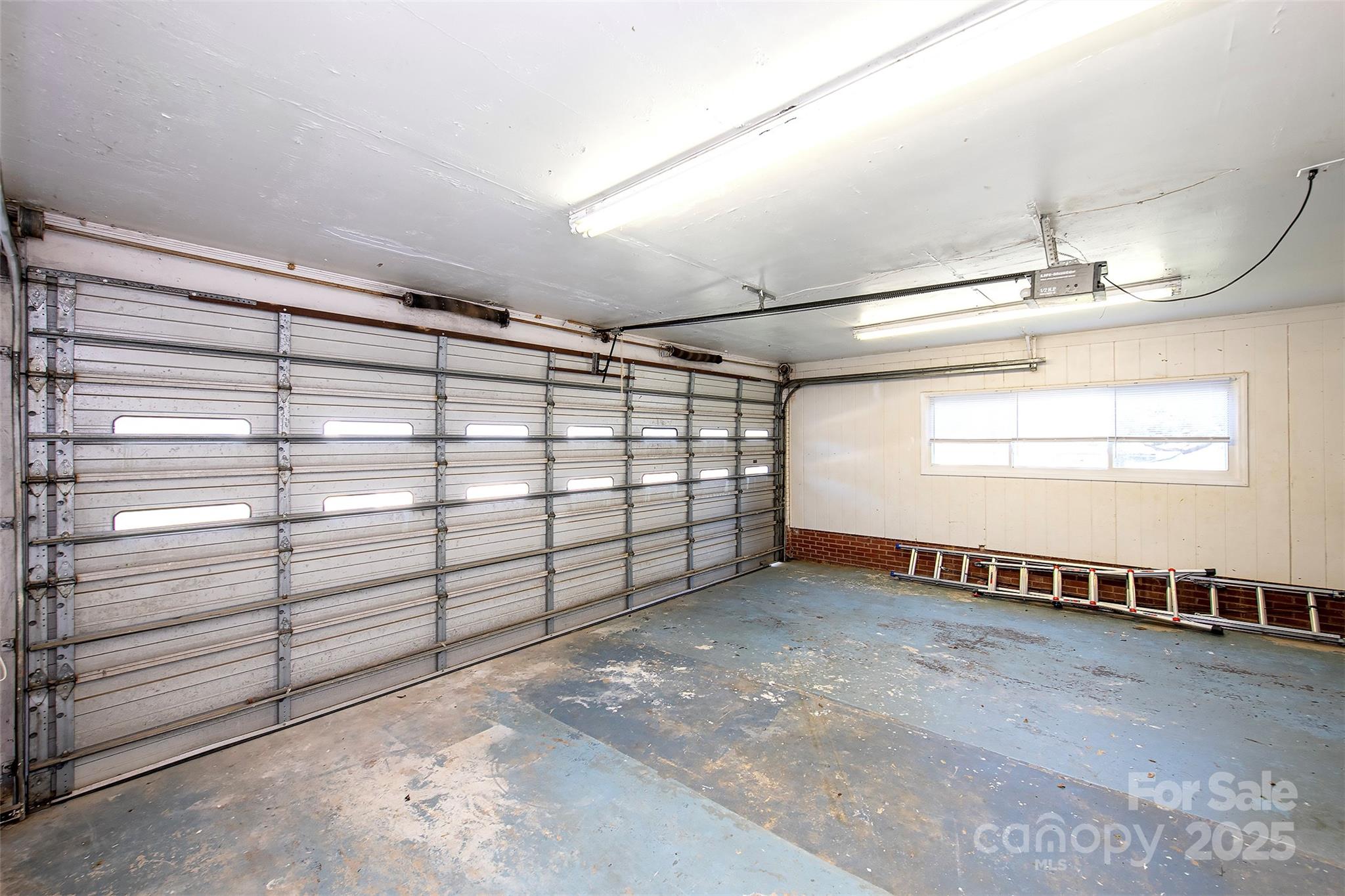1615 Stack Road Monroe, NC 28112 - Photo 27 of 43 a view of a garage with stairs