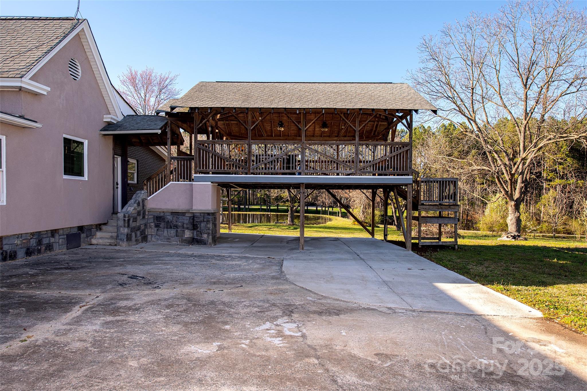 1615 Stack Road Monroe, NC 28112 - Photo 32 of 43 a view of a house with backyard and sitting area