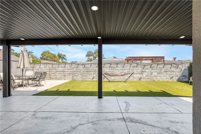 a view of swimming pool with patio