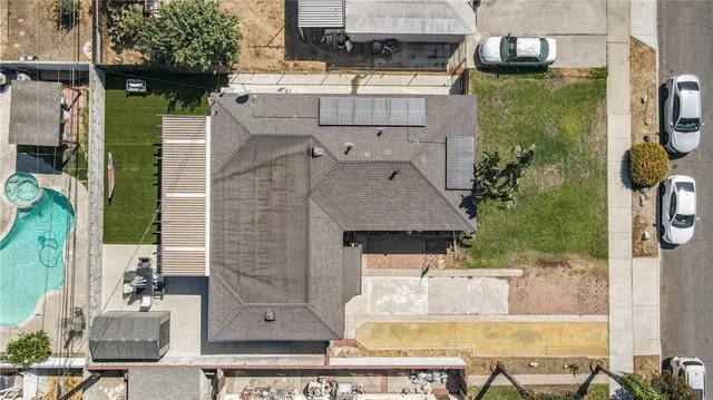 a picture of a room with a white wall and a picture