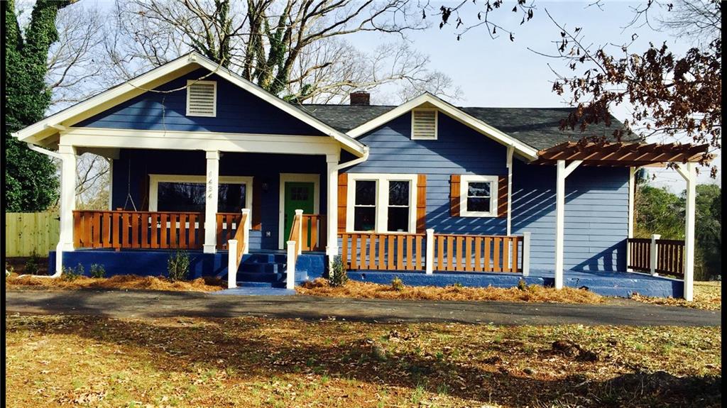 1434 Peachcrest Road Decatur, GA 30032 - Photo 1 of 1 a front view of a house with garden