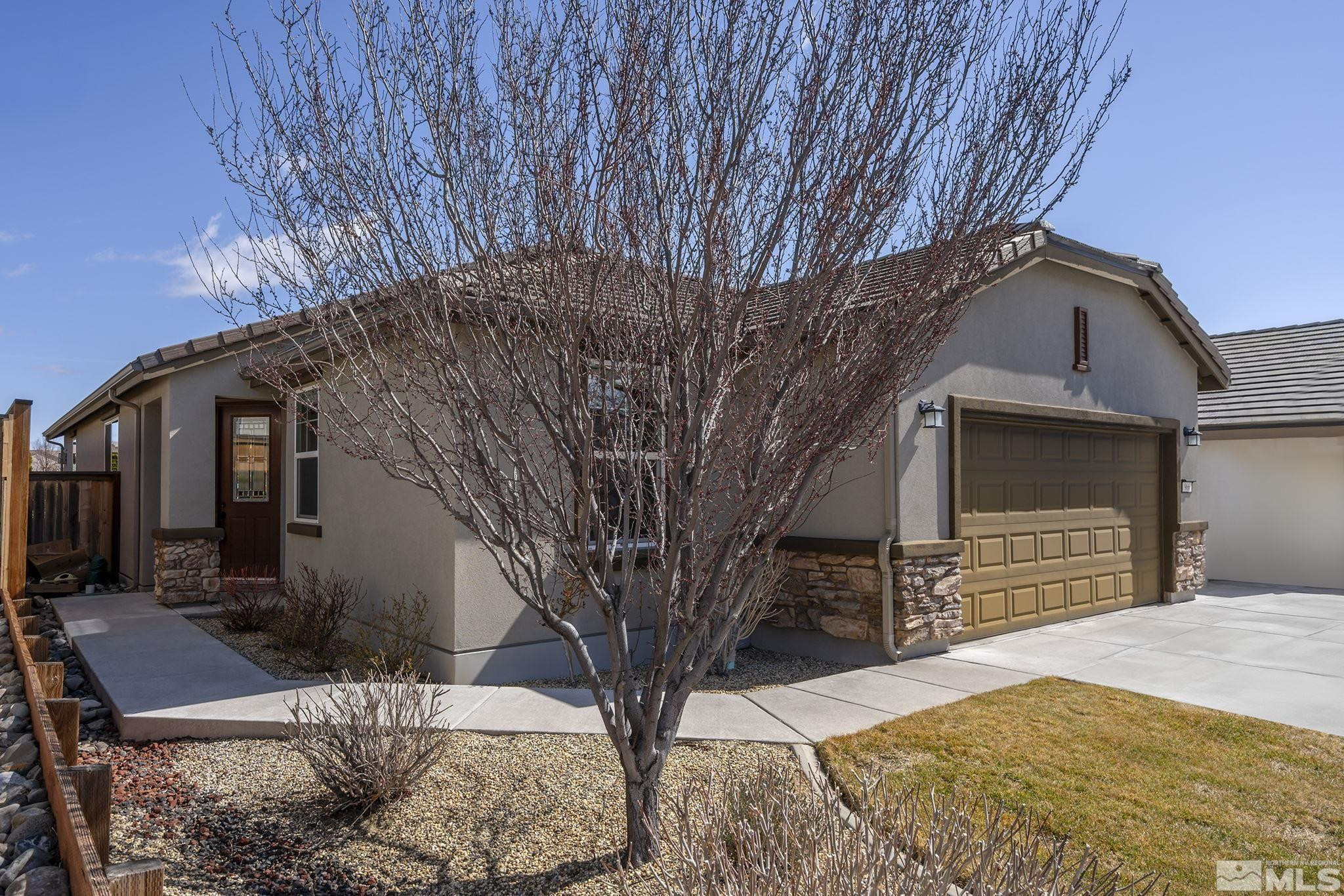 966 Callaway Trail Reno, NV 89523 - Photo 20 of 33 a view of a house with a yard