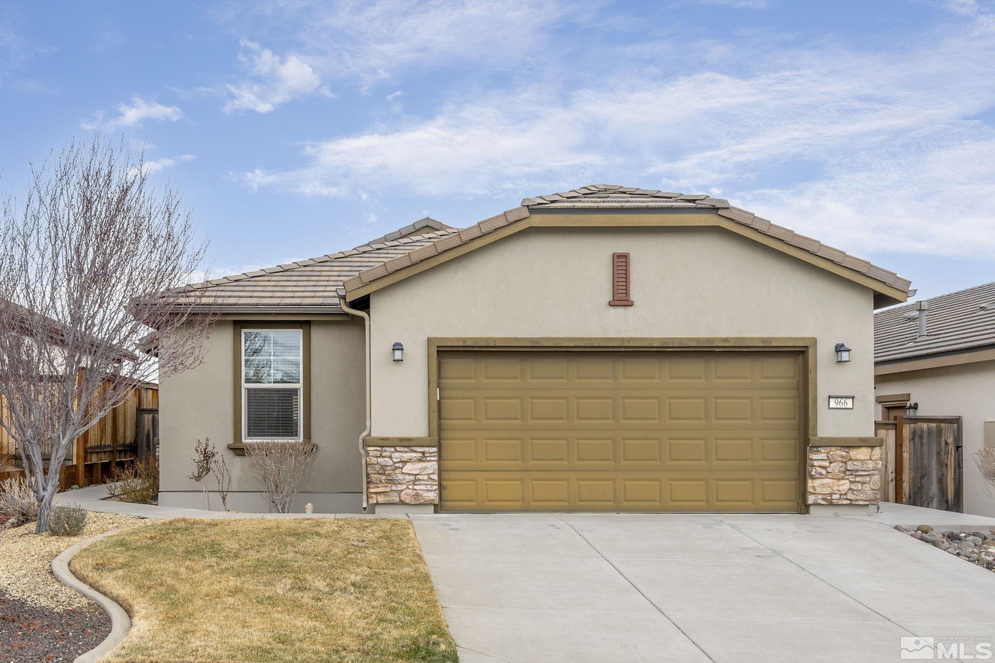 966 Callaway Trail Reno, NV 89523 - Photo 22 of 33 a front view of a house with a yard