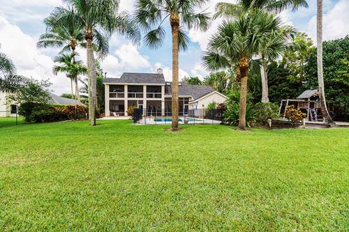 6580 Wood Lake Road Jupiter, FL 33458 - Photo 24 of 26 Rear View